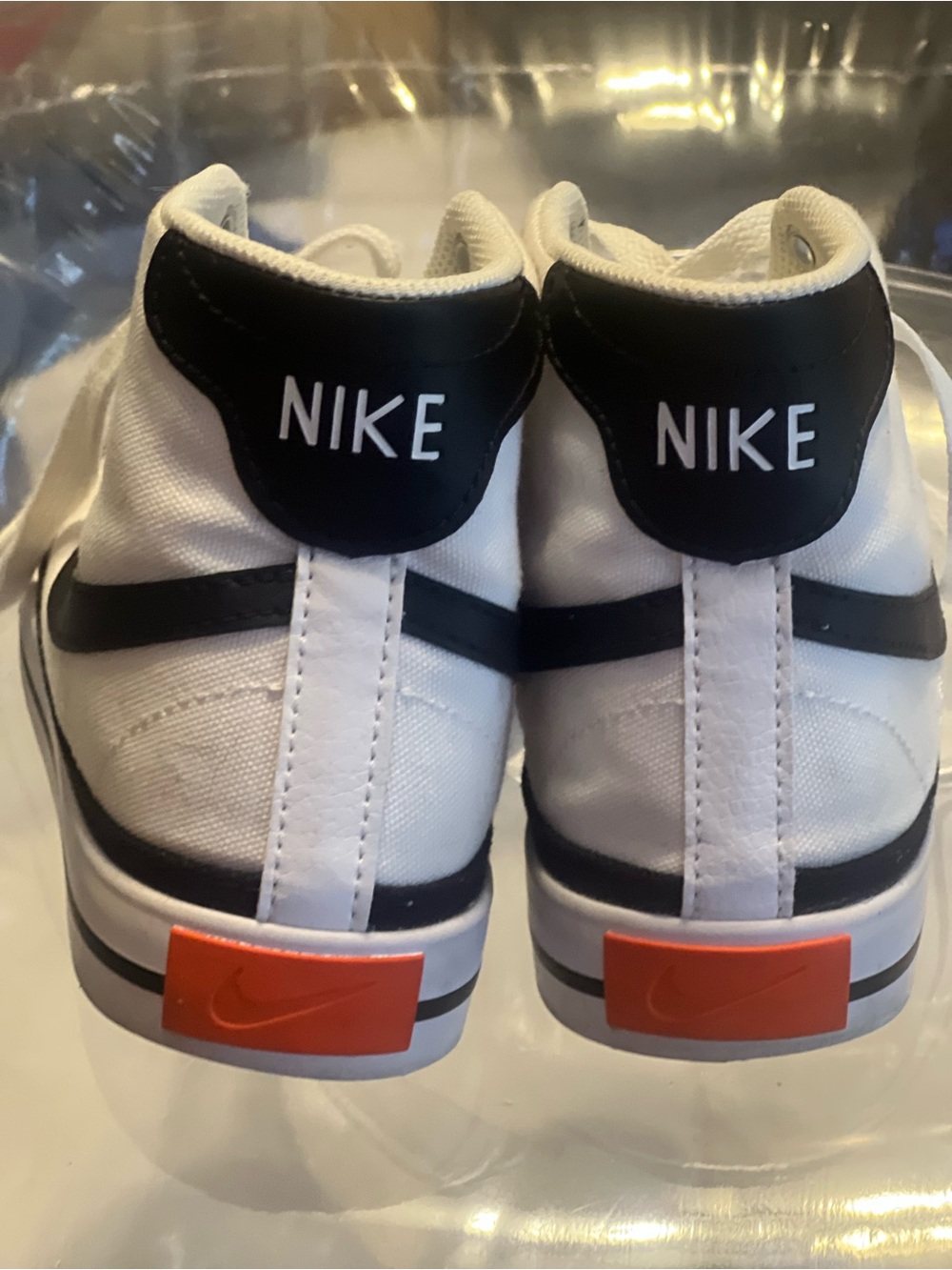 Nike White Black High-Top Sneakers with Orange Heel Tabs